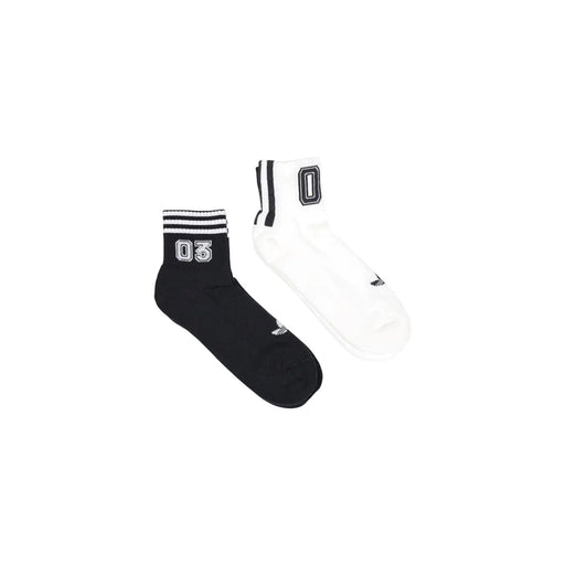 Black and white Adidas Originals men athletic socks with bold 03 and 0 numerals and striped cuffs