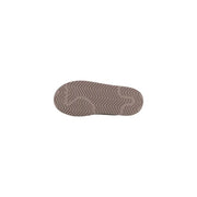 Die Sohle ist aus beigefarbenem Gummi. Adidas Originals Damen-Plateau-Slipper aus Leder mit wellenförmigem Zickzack-Profil