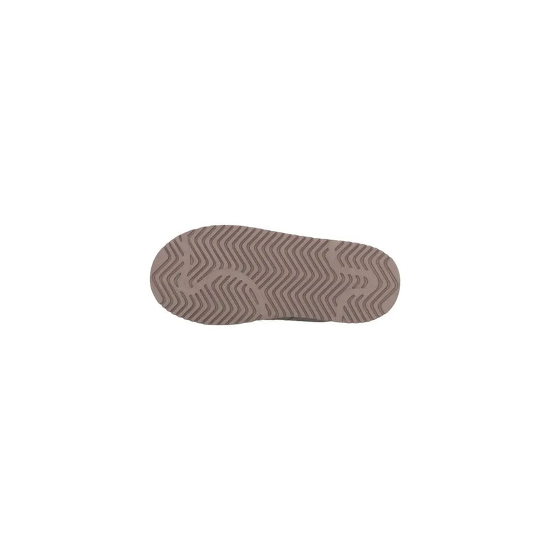 Die Sohle ist aus beigefarbenem Gummi. Adidas Originals Damen-Plateau-Slipper aus Leder mit wellenförmigem Zickzack-Profil