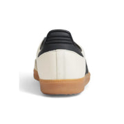 Adidas Damen-Sneaker aus Leder im Samba-Design in Schwarz und Creme mit weißen Schnürsenkeln und Gummisohle