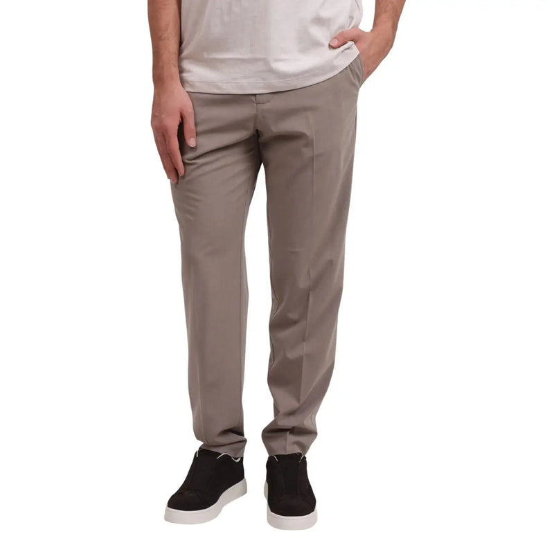 Armani Exchange khaki slim-fit chino pants with tailored design featuring zip and button pockets for fall winter
