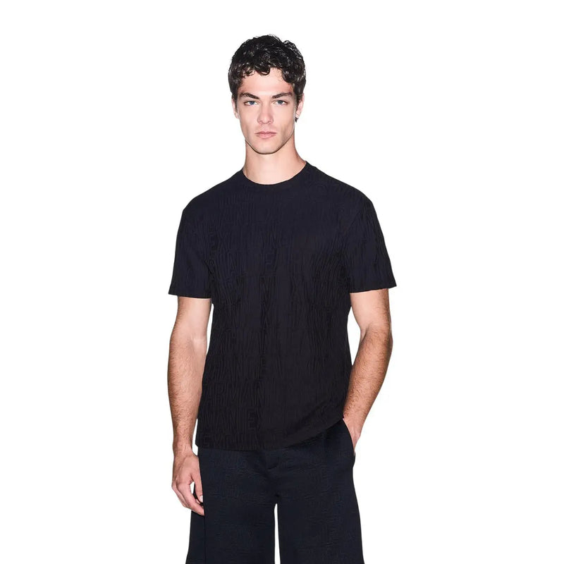 Armani Exchange Schwarzes Herren-T-Shirt aus Baumwolle mit dezentem Rippenmuster und kurzen Ärmeln für die Freizeit.