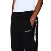 Armani Exchange Schwarze Herren-Trainingshose aus Polyestergemisch mit weißen Seitenstreifen und gesticktem Logo am Oberschenkel