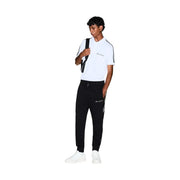 Armani Exchange Schwarze Herren-Jogginghose aus Polyestergemisch mit weißen Seitenstreifen und gesticktem Logo am linken Oberschenkel
