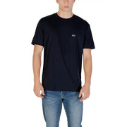 Men’s navy blue short-sleeve T-shirt paired with light wash jeans from Armani Exchange