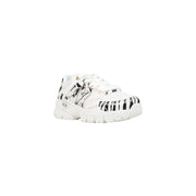 Armani Exchange Schwarze Damen-Sneaker zum Hineinschlüpfen mit weißem Polyester-Obermaterial, auffälligen schwarzen Zebrastreifen und Metallic-Akzenten