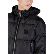 Black hooded puffer jacket with quilted design and silver zipper accents for cold weather use