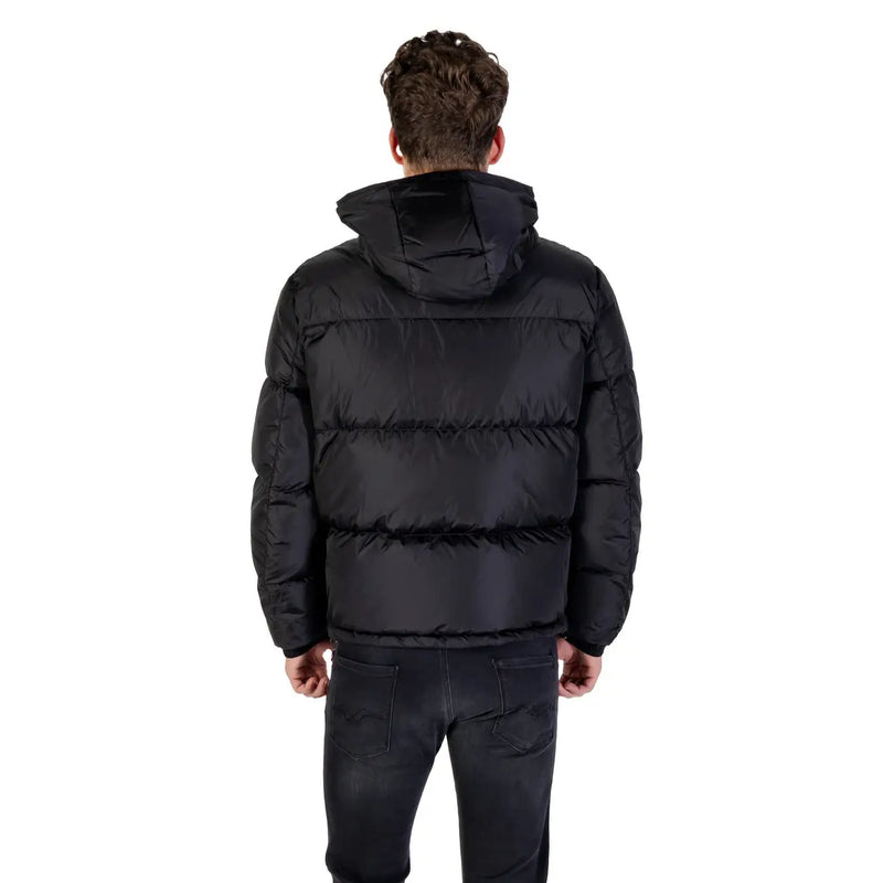 Black hooded puffer jacket with quilted design and hood made from insulated material for cold weather use