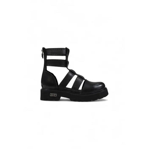 Black leather gladiator-style platform boot with multiple straps and chunky heel