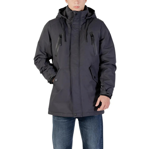 Black waterproof jacket with hood and zipper details.