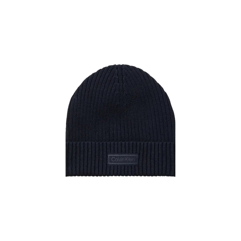 Black ribbed knit beanie with columbia logo patch