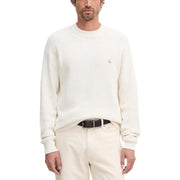 White textured crew neck sweater with logo detail on left chest.