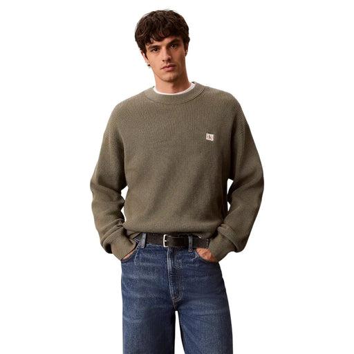 Calvin Klein Jeans Herren grüner Baumwollpullover mit Waffelstrickmuster, strukturierter Strickstruktur und kleinem Markenlabel auf der Brust