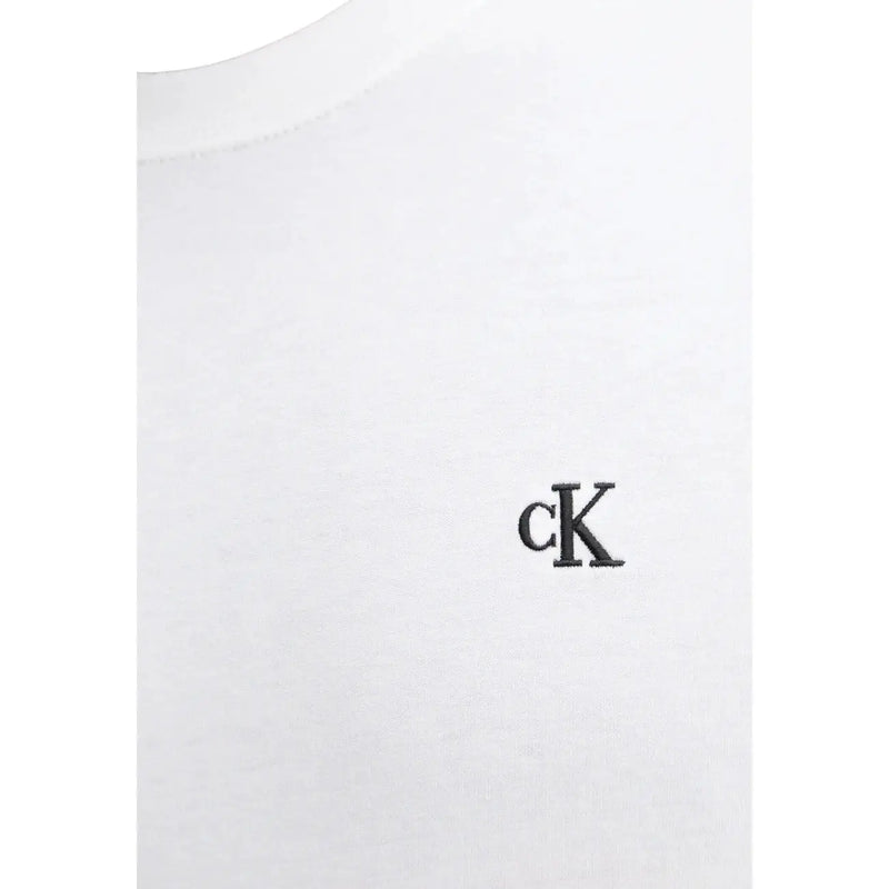 Calvin Klein Jeans men t-shirt in white cotton featuring a subtle black embroidered ck logo on the chest