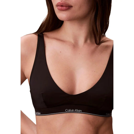 Calvin Klein Jeans Schwarzes Neckholder-Bralette für Damen mit elegantem, minimalistischem Design und dezentem weißen Logo am Unterbrustband