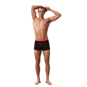 Schwarze Calvin Klein Herren-Boxershorts aus Baumwolle mit rotem Bund und Markenlogo