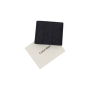 Calvin Klein Schwarze Herren-Geldbörse aus Leder mit Reißverschluss und geprägtem Logomuster, Größe B 2 x H 9 x L 2 cm
