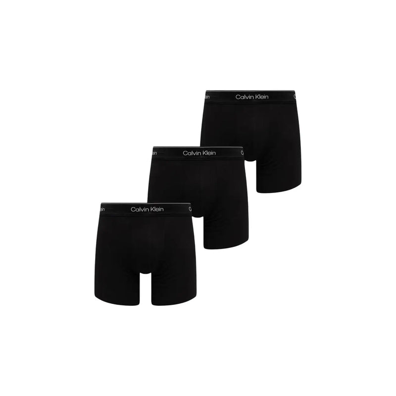 Schwarze Calvin Klein Herren-Boxershorts aus Baumwollstretch mit weißem Logo-Bund, von hinten gesehen