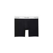 Schwarze Calvin Klein Boxershorts mit weißem Bund und Markenlogo für Herrenunterwäsche