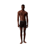 Schwarze Calvin Klein Polyester-Boxershorts mit dezentem weißen Logostreifen, Teil einer 3er-Packung für Herren