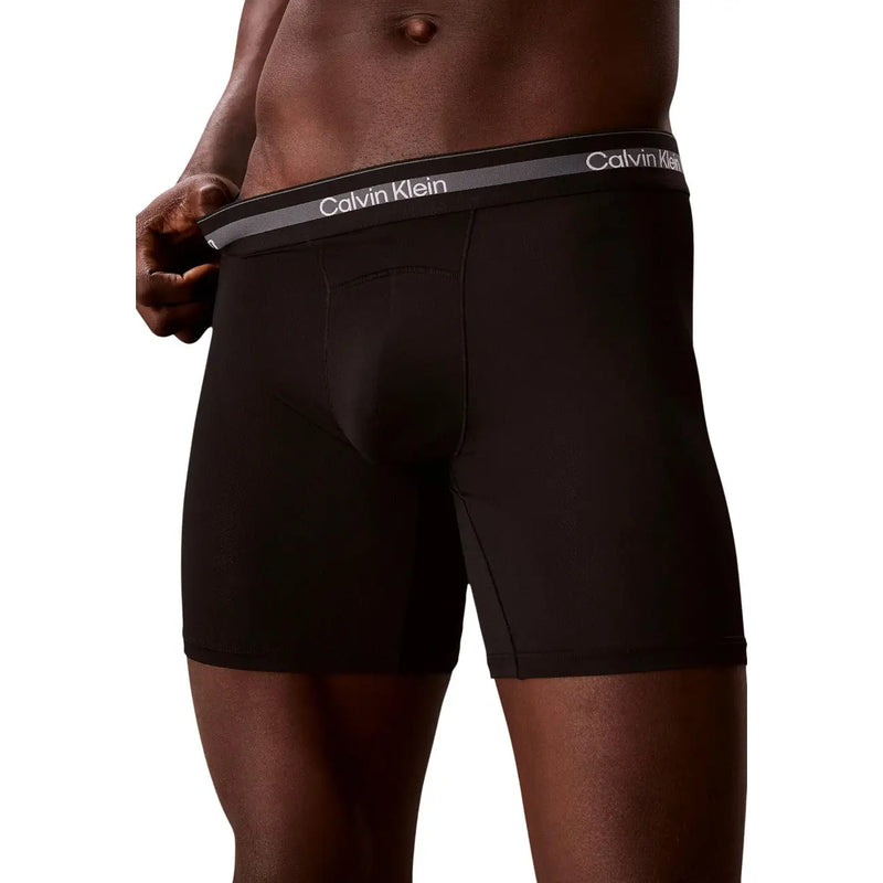 Calvin Klein Schwarze Herren-Boxershorts aus Polyester mit grauem Bund und weißem Logo, 3er-Pack für angenehmen Tragekomfort