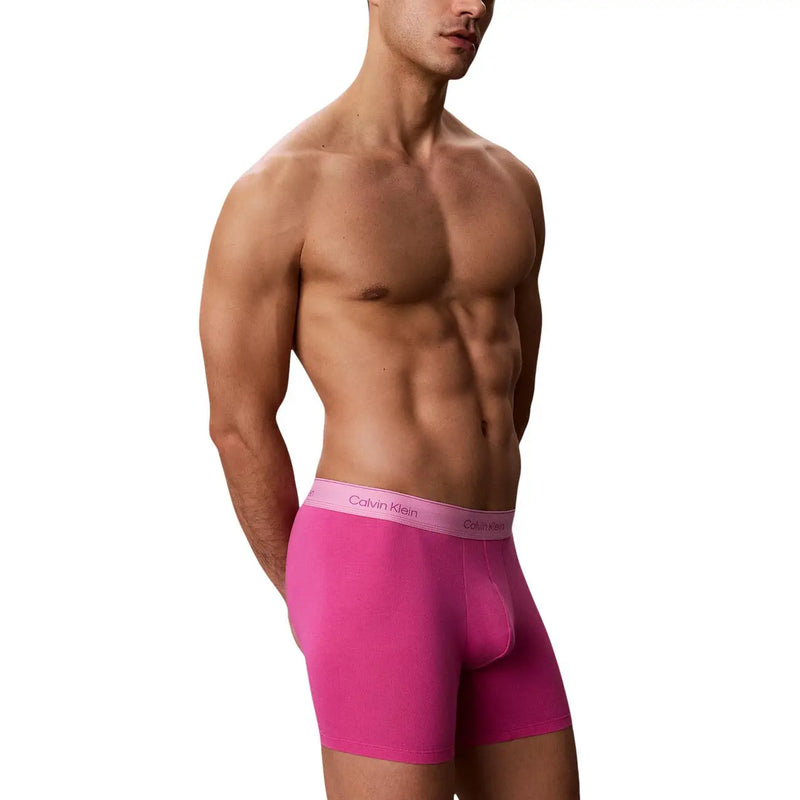 Leuchtend pinkfarbene Calvin Klein Herren-Boxershorts mit passendem Logo-Bund aus Baumwolle, 5er-Packung