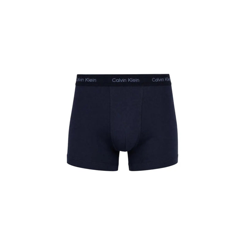 Calvin Klein Herren-Boxershorts aus dunkelblauer Baumwolle mit passendem Logo-Bund aus dem roten 3er-Pack.