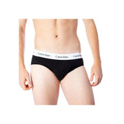 Schwarze Baumwollslips von Calvin Klein mit weißem Gummibund und sich wiederholendem Logo für Herrenunterwäsche