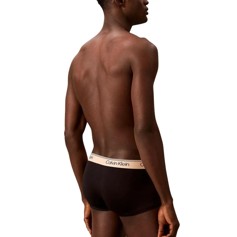 Calvin Klein Schwarze Herren-Baumwoll-Trunk-Slips mit niedrigem Bund und beigem Bund mit Markenlogo