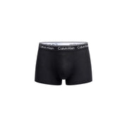 Schwarze Calvin Klein Boxershorts mit weißem Gummibund und schwarzem Logo für Herren, tief sitzende Unterwäsche