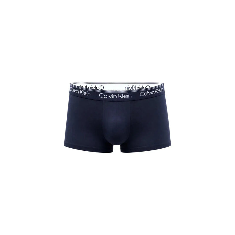 Dunkelblaue Calvin Klein Herren-Slips mit weißem Gummibund und schwarzem Markenlogo für angenehmen Tragekomfort