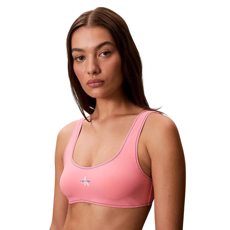Calvin Klein Damen-Strand-Bralette hellblau mit dezenten Ziernähten und kleinem weißen Logo vorne, rosa Sport-BH
