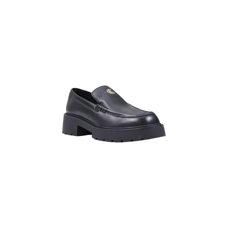 Calvin Klein Schwarze Damen-Sneaker aus Leder im Loafer-Stil mit klobiger Gummisohle und goldenem Logo auf dem Vorderfuß.
