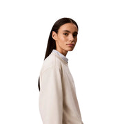Beigefarbenes Baumwoll-Sweatshirt mit Rundhalsausschnitt für Damen von Calvin Klein mit dezentem, gesticktem Logo auf der Brust