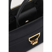 Coccinelle Schwarze Damenhandtasche aus Leder mit goldfarbenen Beschlägen und markantem D-förmigem Verschluss, Modell Arlettis, 24 cm