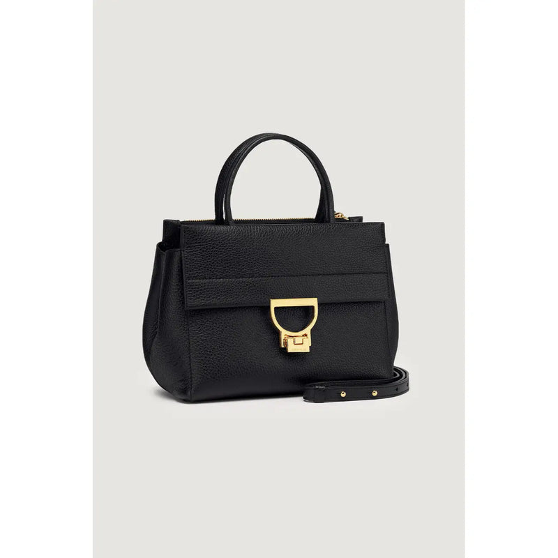 Schwarze Handtasche aus genarbtem Leder von Coccinelle mit goldfarbenem D-förmigem Verschluss und passendem top Griff 24 cm, Modell Arlettis