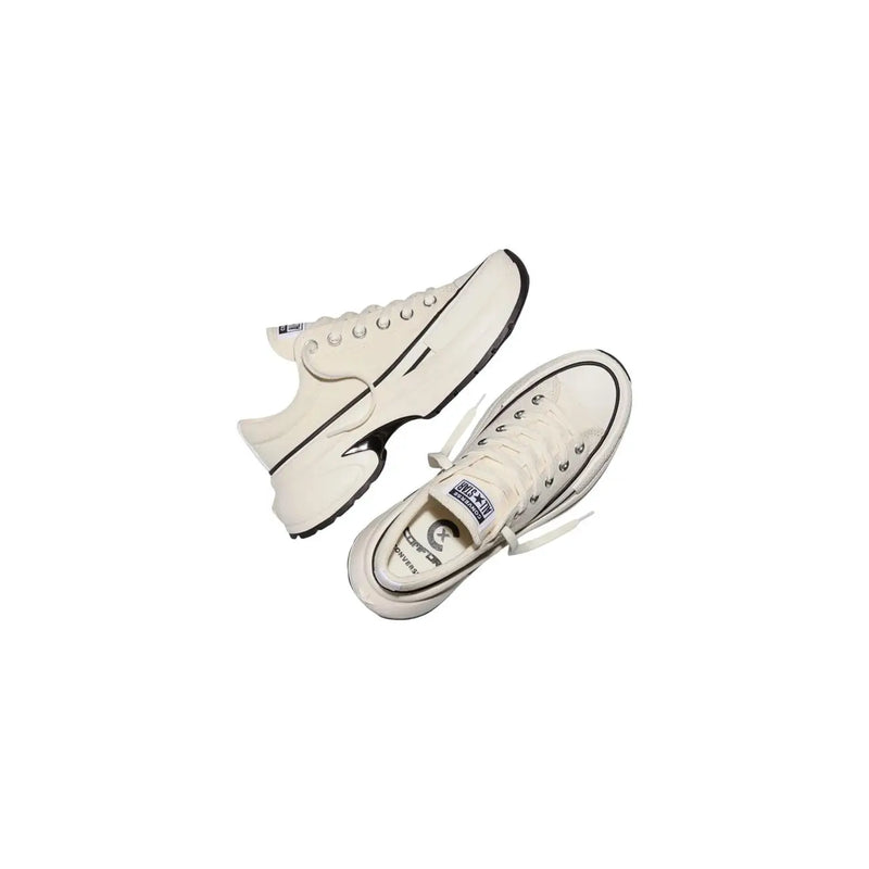 cremefarben converse Damen-Sneaker aus Stoff zum Hineinschlüpfen mit schwarzen Gummisohlen und kontrastierenden schwarzen Nähten