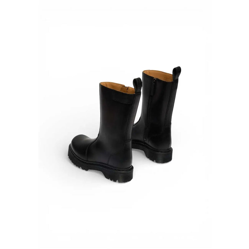 Schwarze Dr. Martens Damen-Ankle-Boots aus Leder mit klobiger Sohle, hellbraunem Futter und Reißverschluss, von der Rückseite gesehen