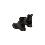 Dr. Martens Damenstiefel aus schwarzem Lackleder, Rückseite gezeigt, entworfen für Herbst und Winter