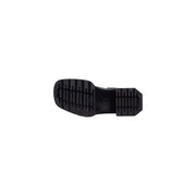 Schwarze Gummisohle mit geripptem Profil und robustem Absatz an der Rückseite der schwarzen Dr. Martens Chelsea Boots aus Leder für Damen.