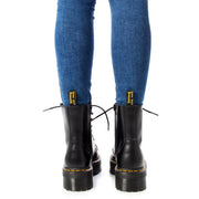 Schwarze Leder-Schnürstiefel für Damen von Dr. Martens, Größe 4, Abbildung der Stiefelrückseite.