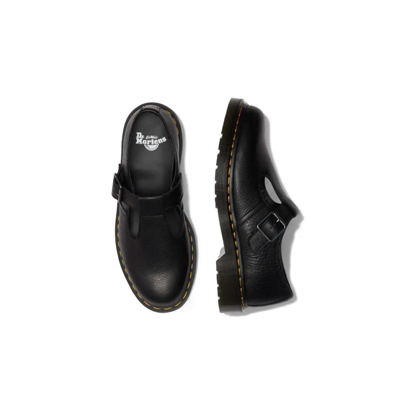 Schwarze Dr. Martens Damen-Slipper aus Leder, von hinten gesehen, mit glattem, schwarzem Leder und Slip-On-Design