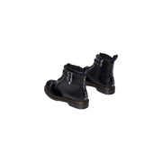 Schwarze Dr. Martens Damenstiefel aus Lackleder mit Samtreißverschluss, der die Rückseite des Schuhwerks zeigt.