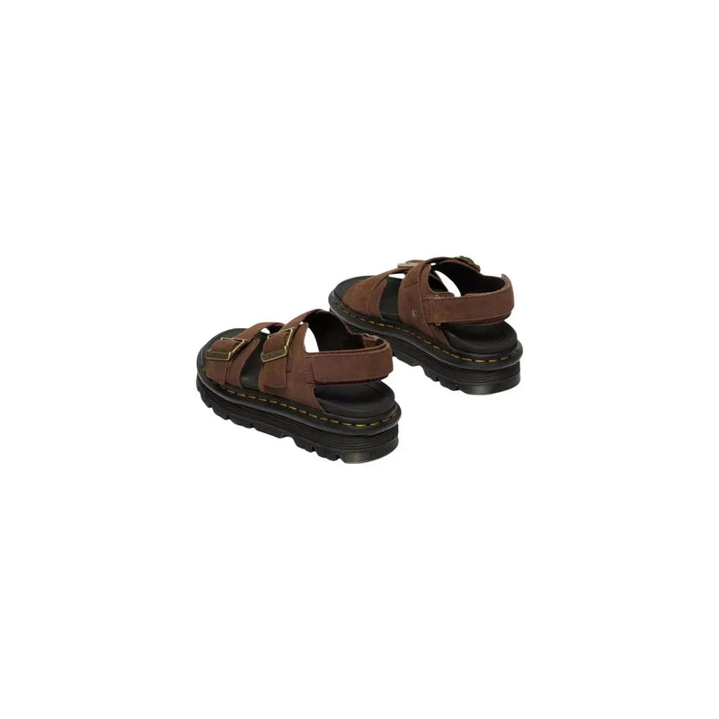 Braune Ledersandalen mit schwarzen Gummisohlen und goldfarbenen Schnallen, Dr. Martens Damen Zebzag-Stil