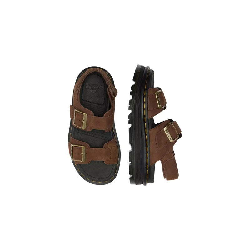 Dr. Martens Damen-Sandalen aus braunem Leder im Zebzag-Stil, die die Rückseite des Schuhwerks zeigen