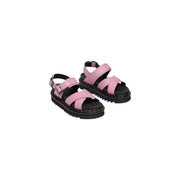 Dr. Martens Damen-Sandalen Voss II aus rosafarbenem Leder mit schwarzen Gummisohlen und silbernen Schnallendetails