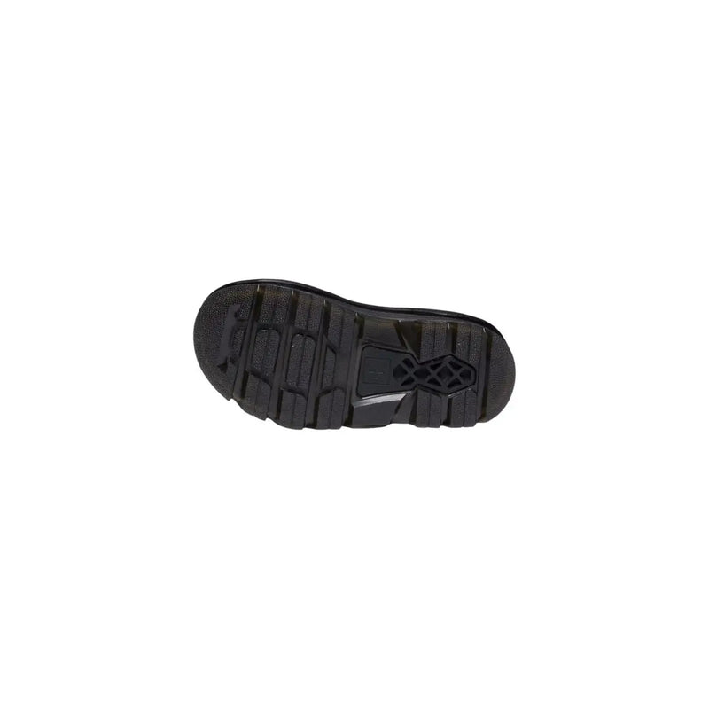 Dr. Martens Damen-Sandalen aus hellbraunem Leder mit Schnalle und schwarzer Gummisohle mit profiliertem Profil und zentralem Logo.
