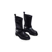 Dr Martens women’s black leather ankle boots with silver buckle accents and chunky textured sole