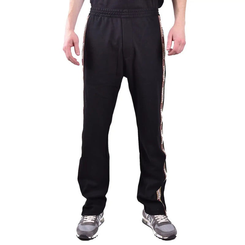 Dsquared Schwarze Herren-Trainingshose aus Baumwollmischgewebe mit strukturiertem Seitenstreifen, verziert mit sich wiederholenden Schriftzügen und Logodetails.