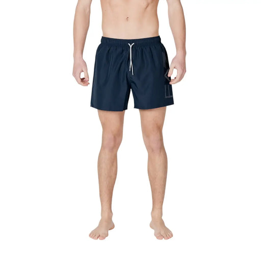 Navy blue EA7 men polyester swim trunks with white drawstring and subtle geometric logo on the side